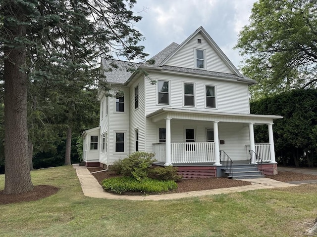 117 Rogers, West Springfield, MA 01089 - traditional style home featuring a porch, a front yard, and roof with shingles