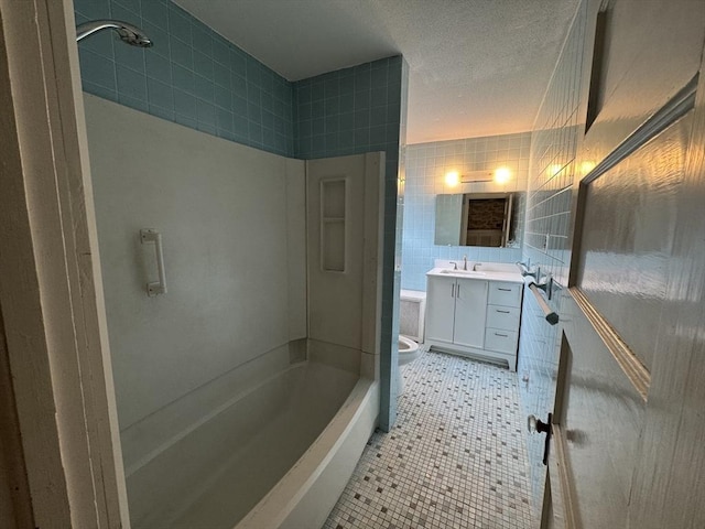 117 Rogers, West Springfield, MA 01089 - full bathroom with tile walls, tile patterned floors, vanity, and shower / bath combination
