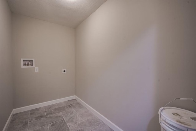 washroom featuring hookup for a washing machine, laundry area, hookup for an electric dryer, and baseboards