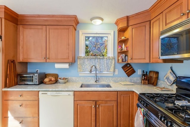 kitchen with a sink, stainless steel microwave, gas range oven, white dishwasher, and a toaster