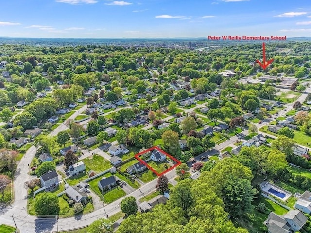 aerial view of property and surrounding area with property boundaries highlighted