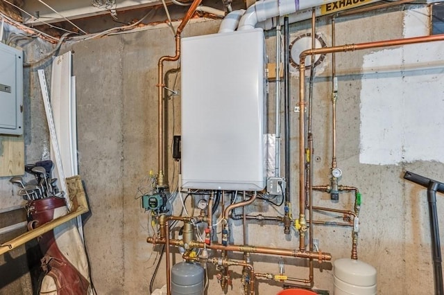 utility room with water heater and electric panel