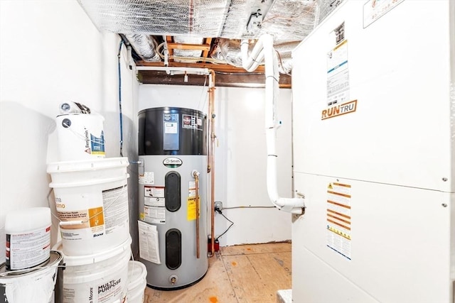 utility room with heating unit and hybrid water heater