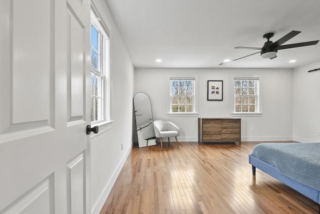 bedroom featuring recessed lighting, wood-type flooring, ceiling fan, and baseboards