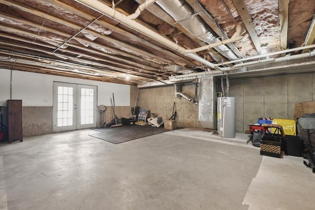 basement featuring water heater and french doors