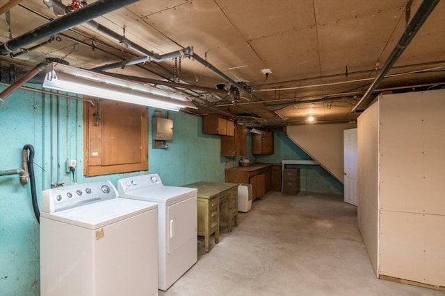 unfinished below grade area featuring washer and dryer