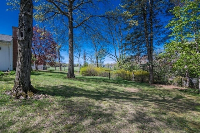 view of yard with fence