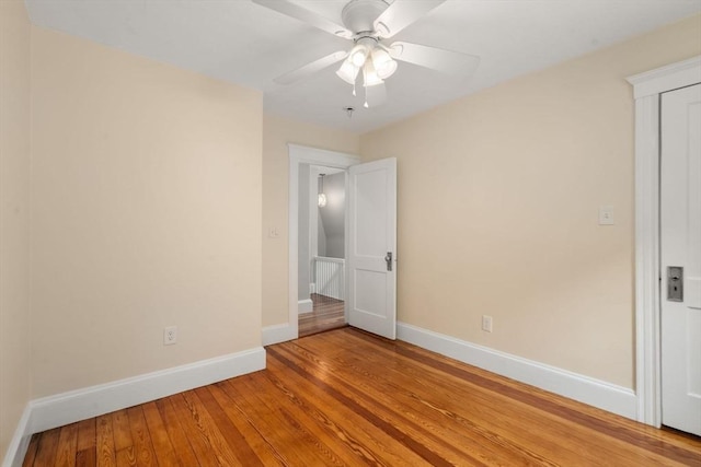 14 E Division St, Holbrook, MA 02343 - spare room featuring baseboards, light wood-type flooring, and a ceiling fan