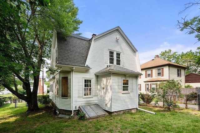 14 E Division St, Holbrook, MA 02343 - back of house with roof with shingles and a gambrel roof