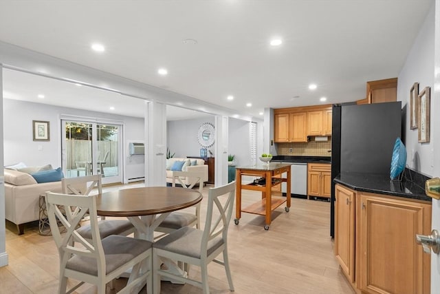 dining room with light hardwood / wood-style floors