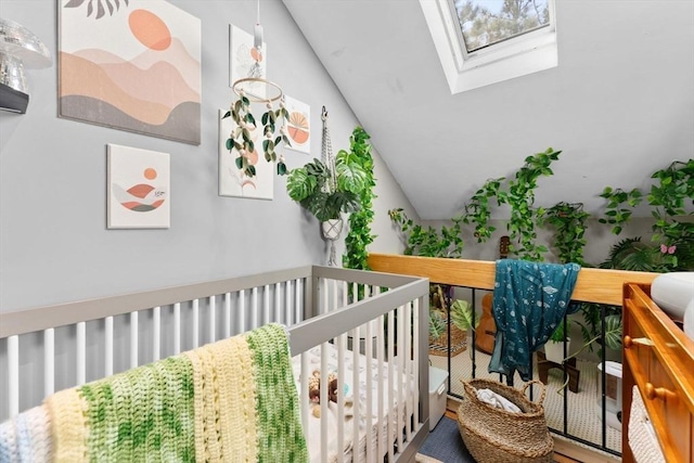 2A Brewer St, Boston, MA 02130 - bedroom with lofted ceiling, a skylight, and a nursery area
