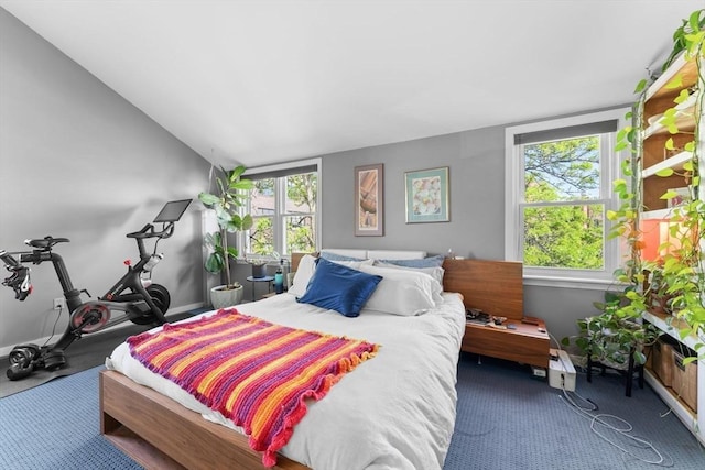 2A Brewer St, Boston, MA 02130 - carpeted bedroom with baseboards and lofted ceiling