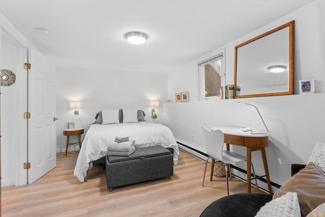 2A Brewer St, Boston, MA 02130 - bedroom featuring light wood-style flooring and a baseboard heating unit