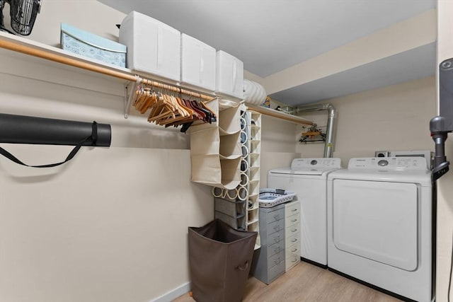 2A Brewer St, Boston, MA 02130 - laundry area with washing machine and clothes dryer and light wood-type flooring