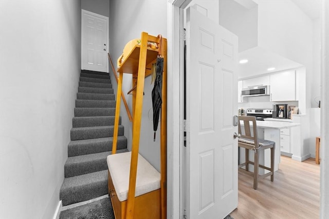 2A Brewer St, Boston, MA 02130 - stairs with wood finished floors and baseboards