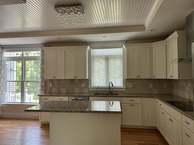61 School St Unit B, Natick, MA 01760 - kitchen featuring black electric cooktop, wall chimney exhaust hood, healthy amount of natural light, crown molding, and recessed lighting