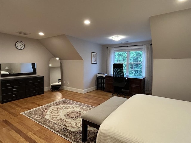 61 School St Unit B, Natick, MA 01760 - bedroom featuring an office area, wood finished floors, recessed lighting, and lofted ceiling