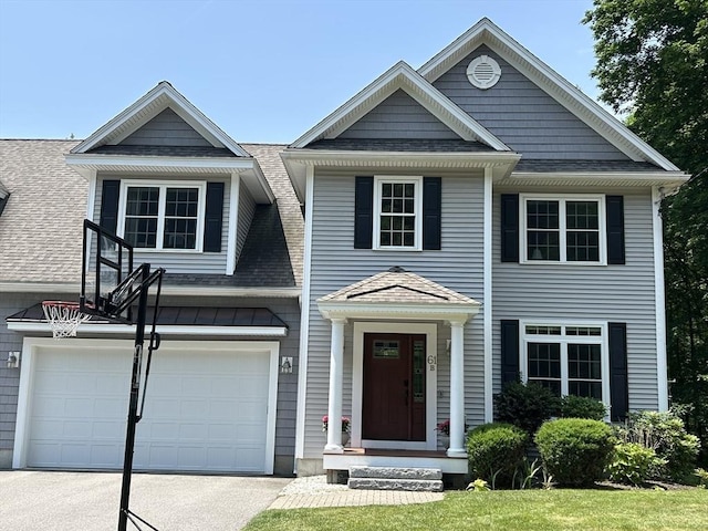 61 School St Unit B, Natick, MA 01760 - view of front facade with a shingled roof, asphalt driveway, and an attached garage