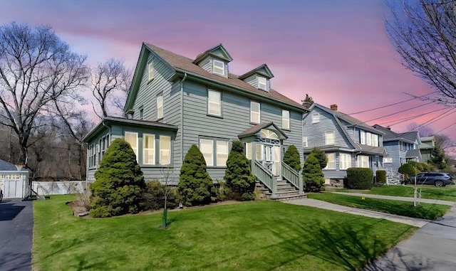 view of front of home with a front yard