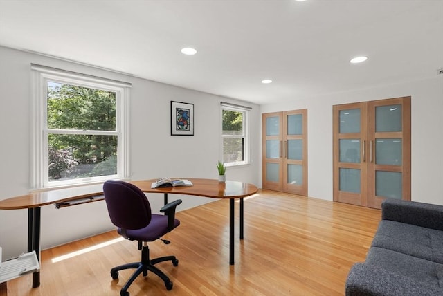 169 Hickory Rd, Weston, MA 02493 - home office with light wood-type flooring, recessed lighting, and french doors