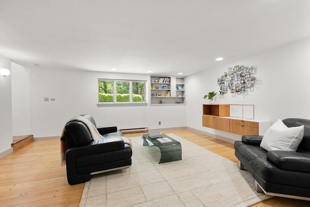 169 Hickory Rd, Weston, MA 02493 - living area featuring baseboard heating, light wood-type flooring, recessed lighting, and baseboards