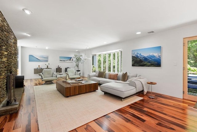 169 Hickory Rd, Weston, MA 02493 - living room featuring wood-type flooring, recessed lighting, and heating unit