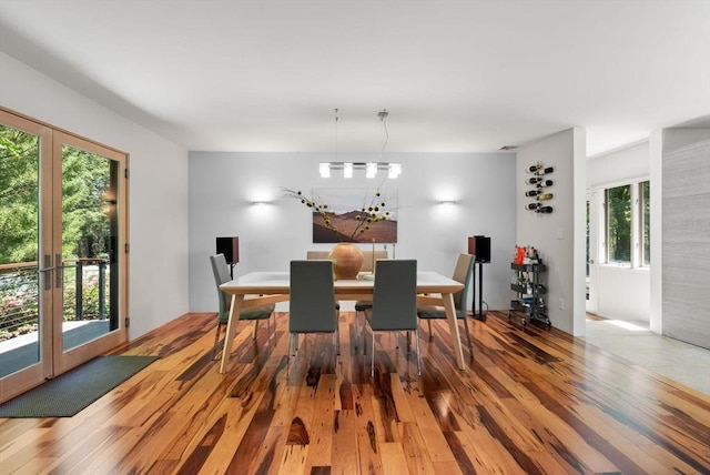 169 Hickory Rd, Weston, MA 02493 - dining space with light wood-type flooring and french doors
