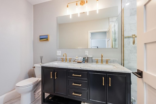 101 Draper St Unit 3, Boston, MA 02122 - full bath with toilet, double vanity, marble finish flooring, and baseboards
