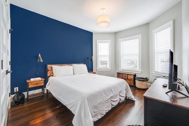 101 Draper St Unit 3, Boston, MA 02122 - bedroom featuring dark wood finished floors and baseboards