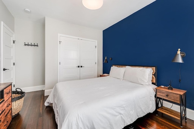 101 Draper St Unit 3, Boston, MA 02122 - bedroom with dark wood-style floors, baseboards, and a closet