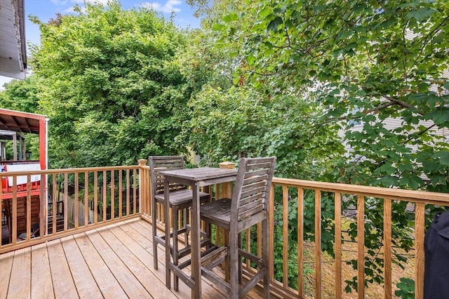 101 Draper St Unit 3, Boston, MA 02122 - wooden deck with outdoor dining area