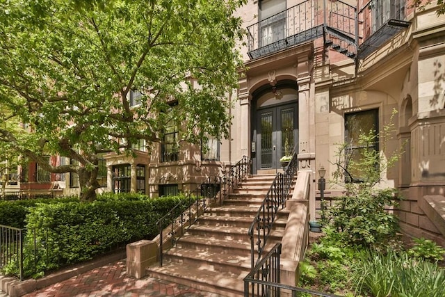 doorway to property featuring french doors