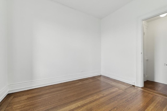 empty room featuring wood finished floors