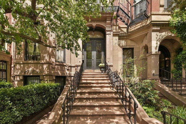 entrance to property featuring french doors