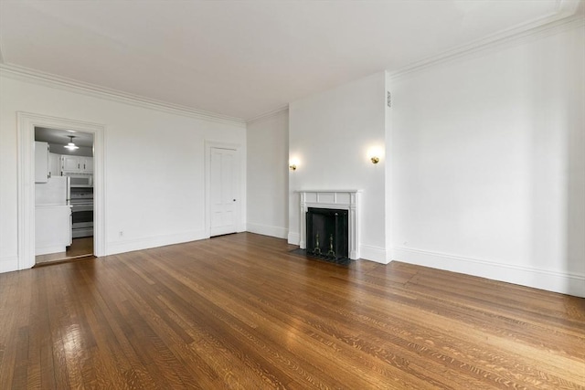 unfurnished living room featuring dark wood finished floors, a fireplace with flush hearth, crown molding, and baseboards