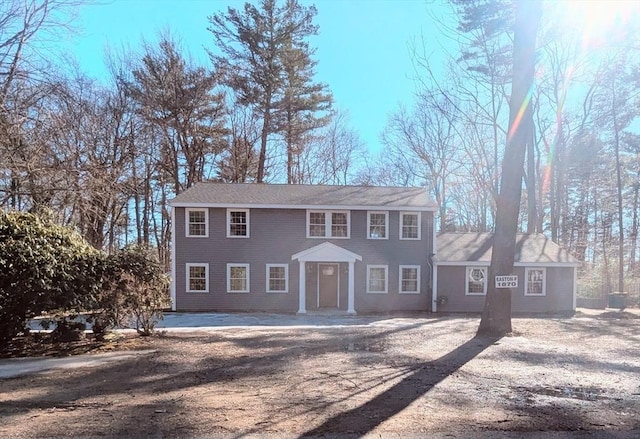 colonial home with driveway