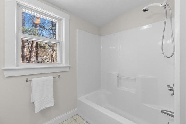 full bathroom featuring baseboards, shower / washtub combination, and tile patterned flooring