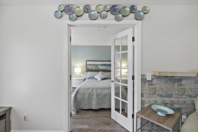 bathroom featuring french doors and wood finished floors