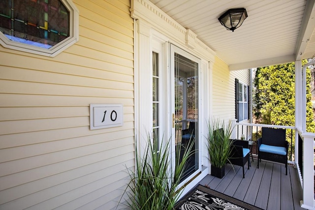 wooden deck with a porch