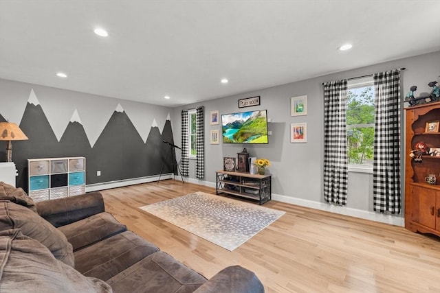 101 Titicut Rd, Raynham, MA 02767 - living room with a baseboard heating unit, recessed lighting, wood finished floors, and baseboards