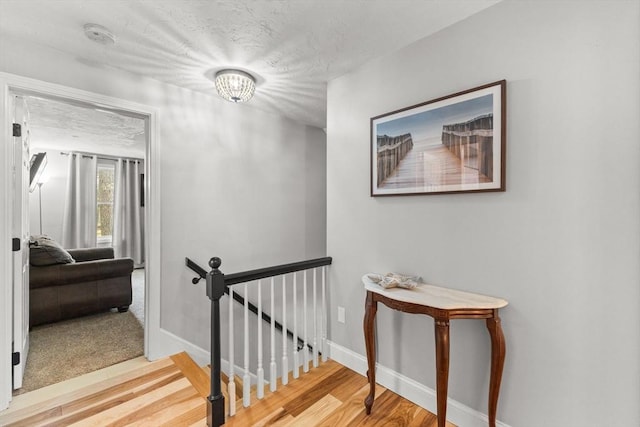 101 Titicut Rd, Raynham, MA 02767 - stairway with wood finished floors and baseboards