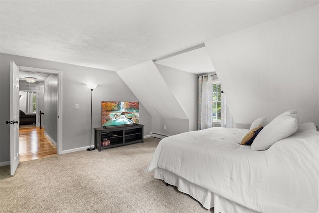 101 Titicut Rd, Raynham, MA 02767 - bedroom with carpet flooring, baseboards, baseboard heating, and lofted ceiling
