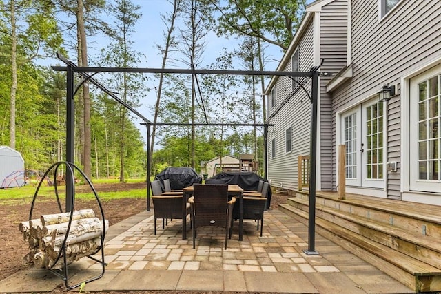 101 Titicut Rd, Raynham, MA 02767 - view of patio featuring outdoor dining space and french doors
