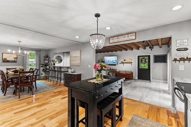 101 Titicut Rd, Raynham, MA 02767 - dining space with a chandelier, light wood-style flooring, beam ceiling, and recessed lighting