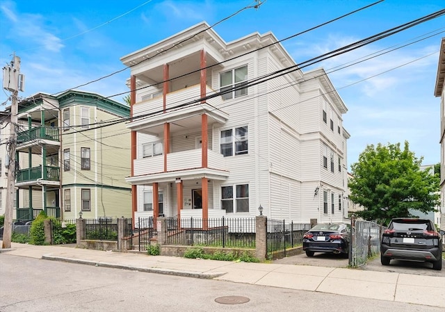5 Sutton St Unit 3B, Boston, MA 02126 - view of front of house featuring a fenced front yard