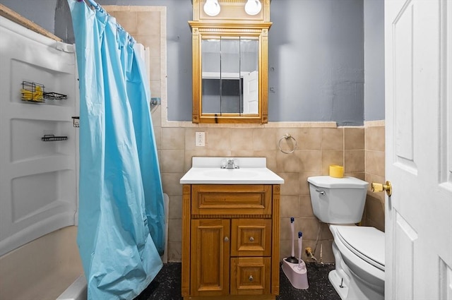 5 Sutton St Unit 3B, Boston, MA 02126 - full bathroom featuring tile walls, toilet, vanity, a shower with shower curtain, and wainscoting