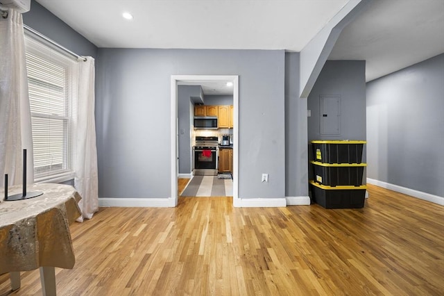 5 Sutton St Unit 3B, Boston, MA 02126 - unfurnished living room featuring baseboards, light wood-style flooring, and recessed lighting