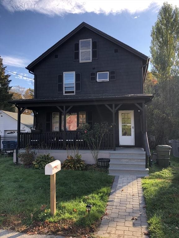 82 Grove St, North Brookfield, MA 01535 - view of front of house with a porch and a front yard
