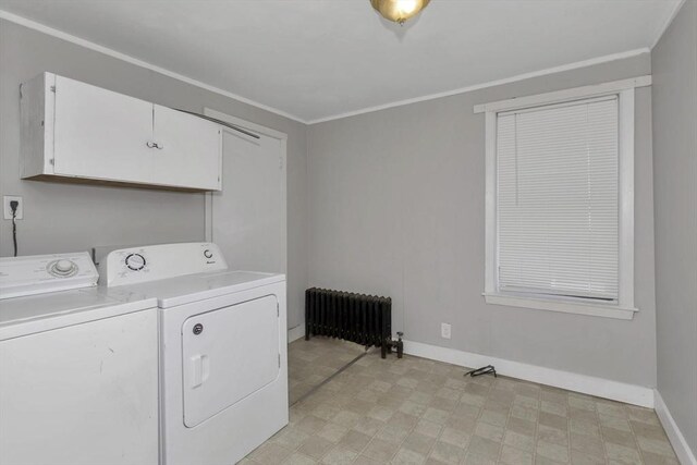 82 Grove St, North Brookfield, MA 01535 - laundry room with radiator, washer and dryer, cabinet space, baseboards, and light flooring