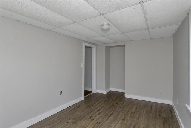 82 Grove St, North Brookfield, MA 01535 - spare room featuring wood finished floors, baseboards, and a paneled ceiling